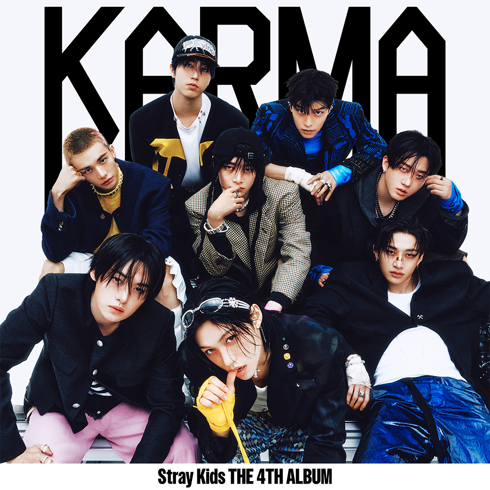 Stray Kids K‑pop group promotional photo featuring all eight members.