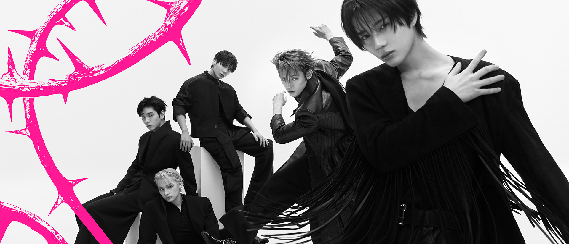 TXT members displaying their individual visuals in a unified group portrait.